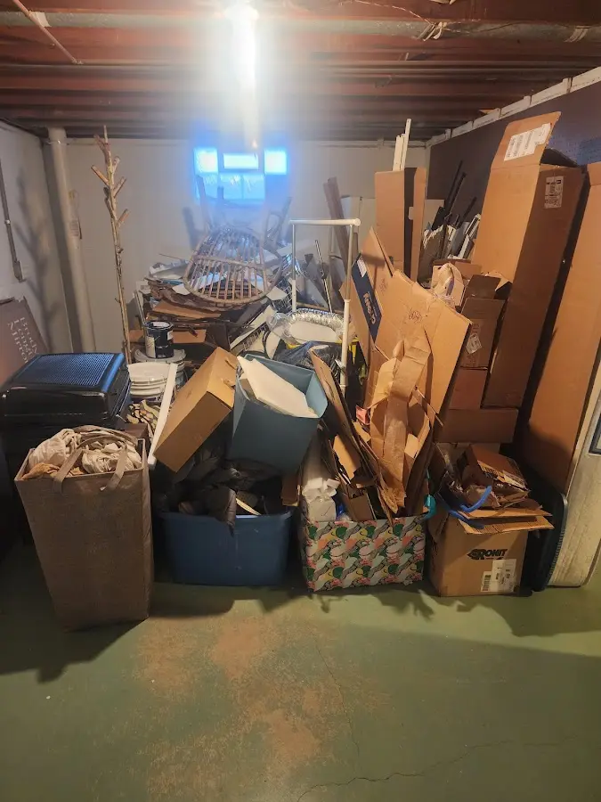 Roll-off dumpster container at job site for 4 Yard Dumpster Rental in Gravette